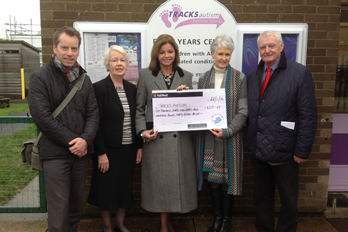 Charity cheque presentation to Tracks Autism in 2014